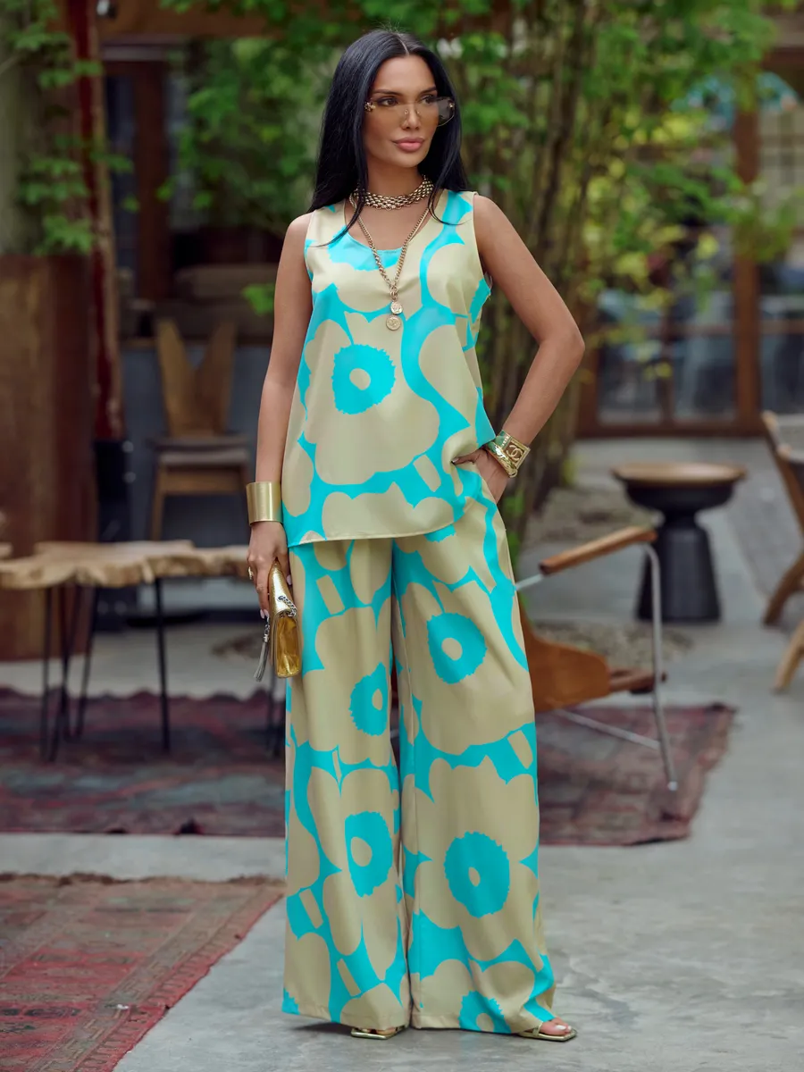 Бирюзовый костюм брючный праздничный