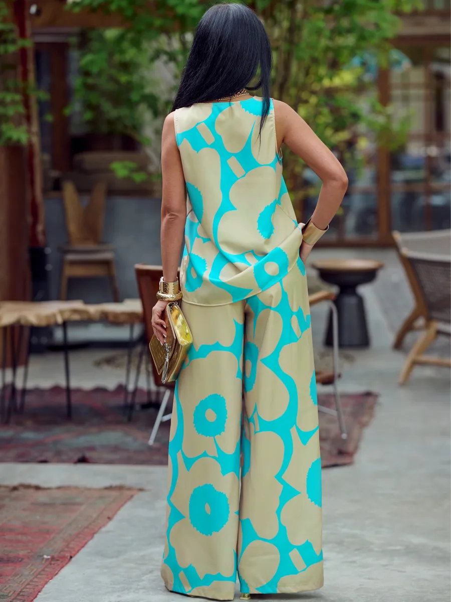 Бирюзовый костюм брючный праздничный