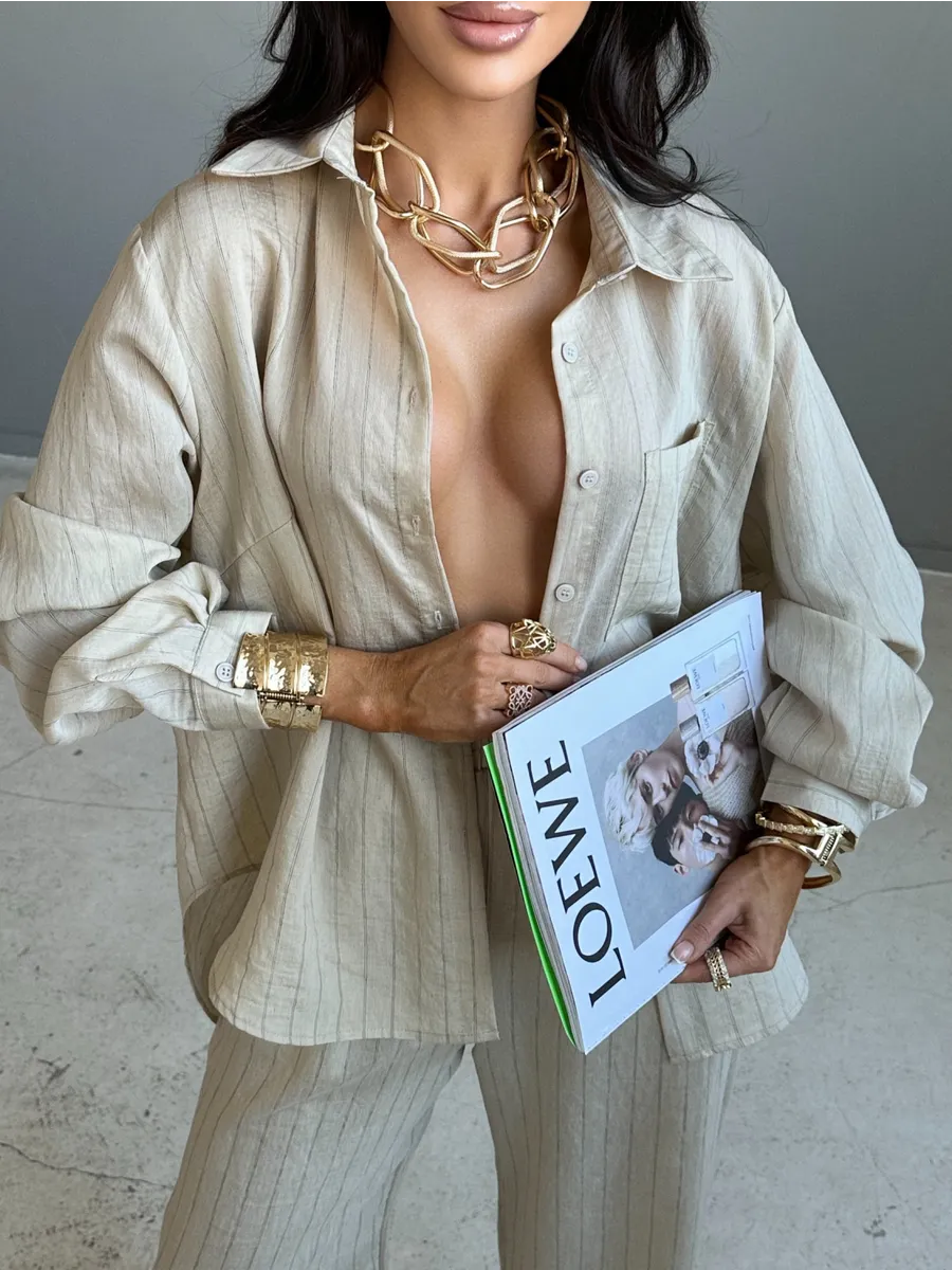 Бежевый костюм брючный летний