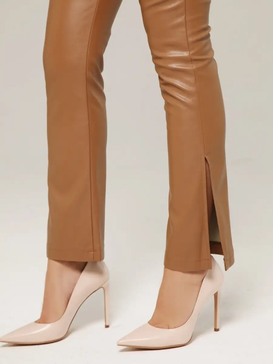 Брюки женские кожаные из экокожи с разрезами внизу