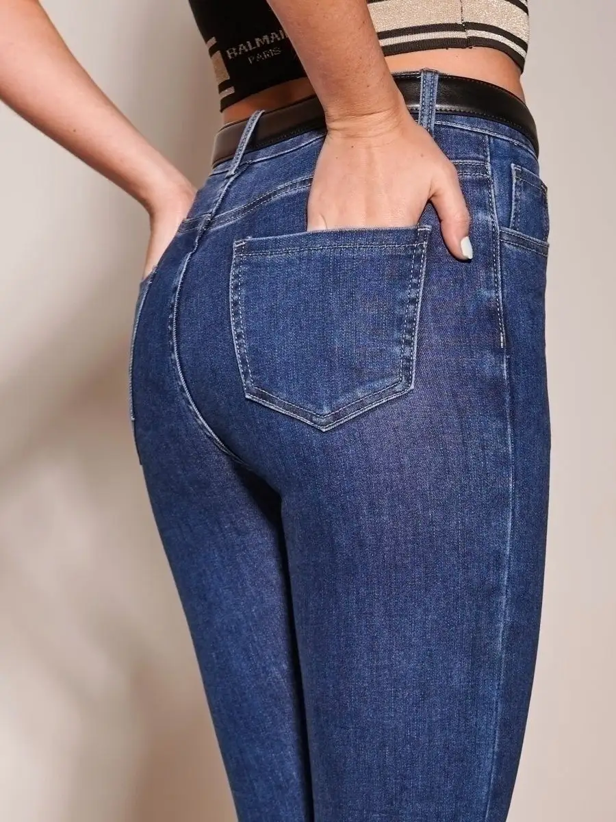 Джинсы клеш от колена с разрезами