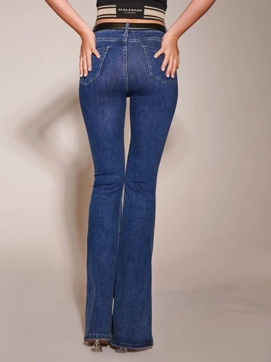 Джинсы клеш от колена с разрезами