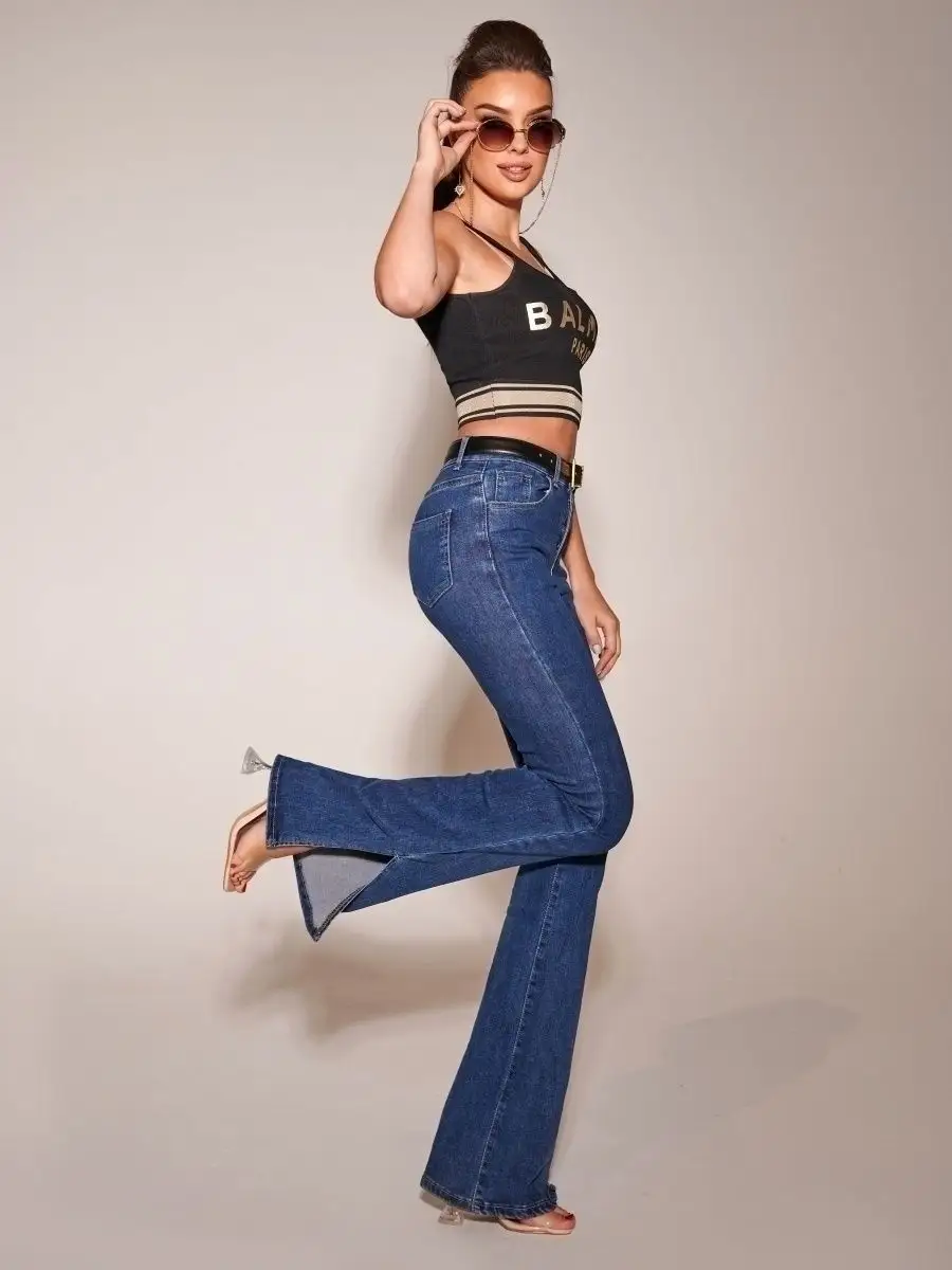 Джинсы клеш от колена с разрезами