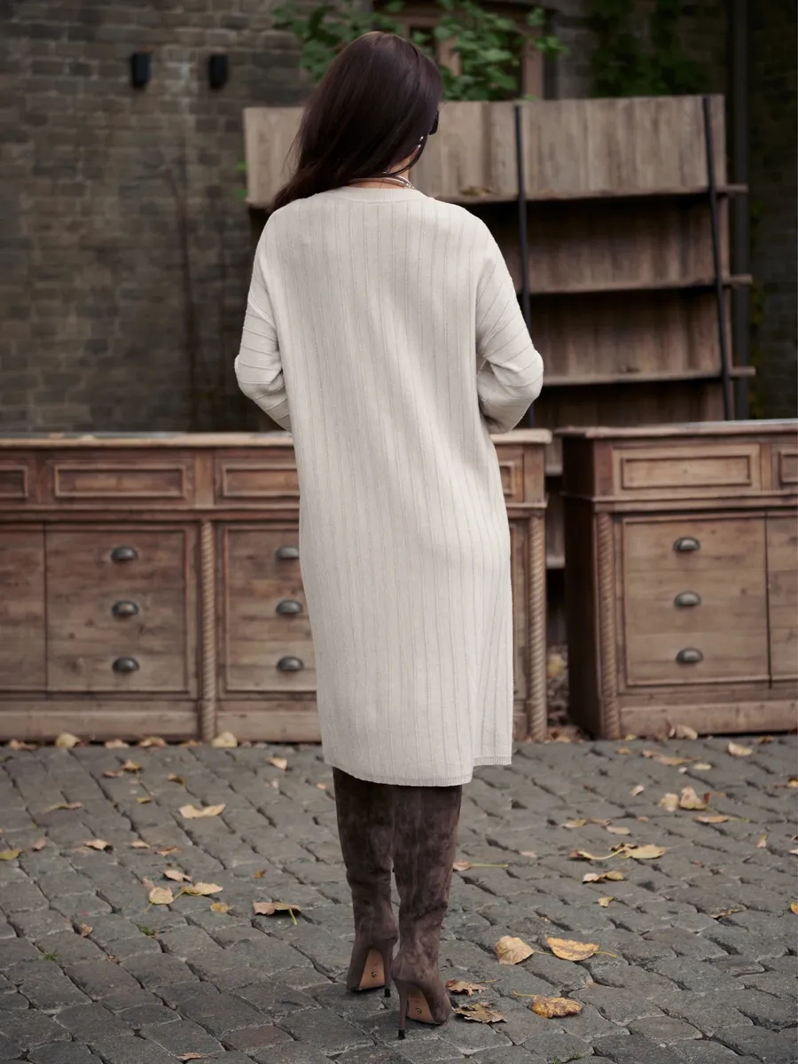 Бежевое платье трикотажное нарядное теплое