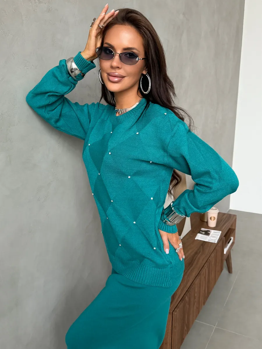 Зеленый теплый трикотажный костюм с юбкой