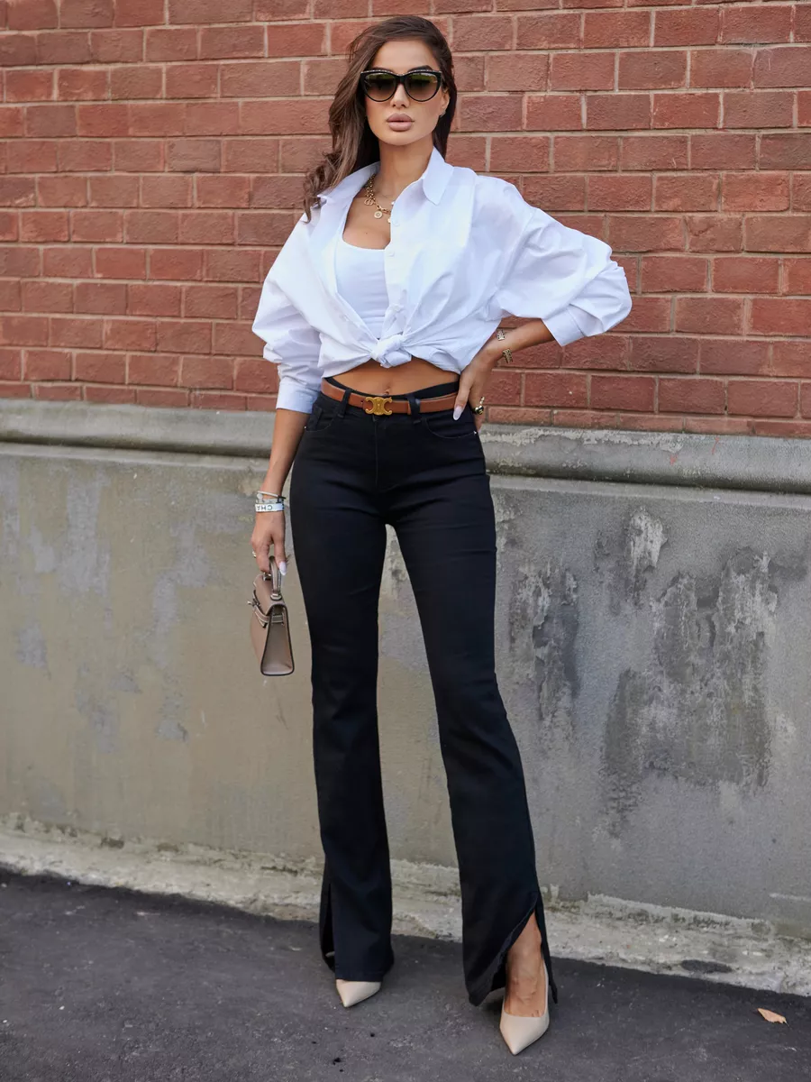 Джинсы клеш от колена с разрезами