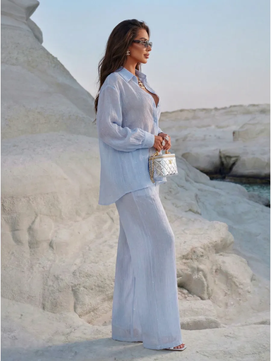 Голубой костюм брючный летний