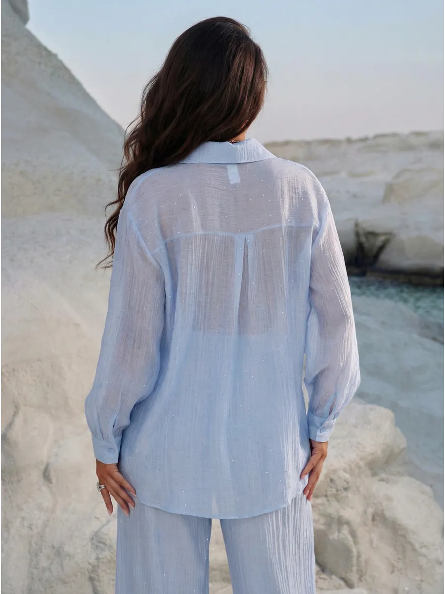 Голубой костюм брючный летний