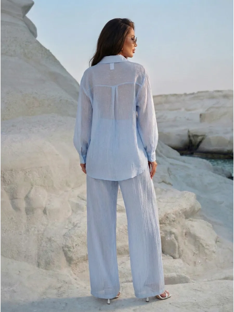 Голубой костюм брючный летний