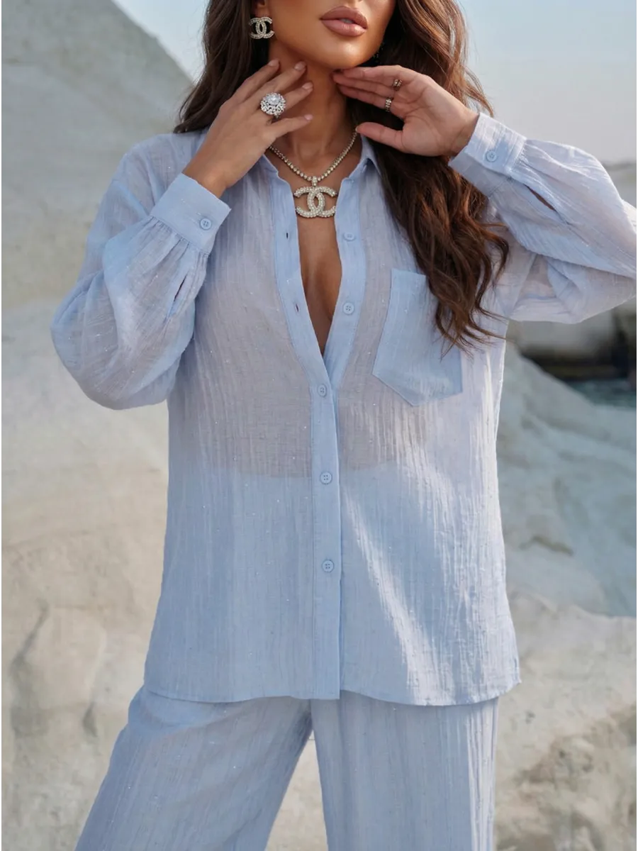 Голубой костюм брючный летний