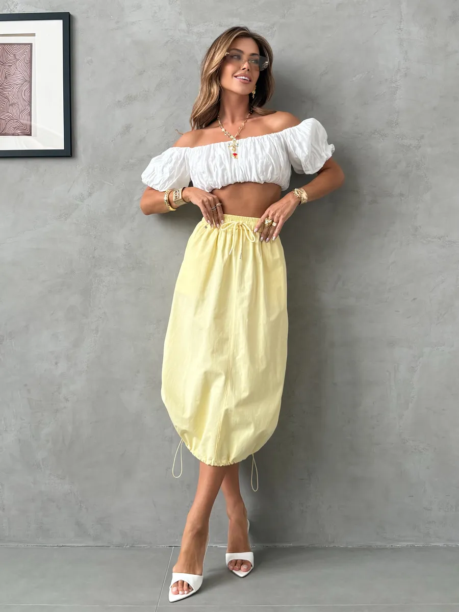 Желтая длинная летняя юбка миди