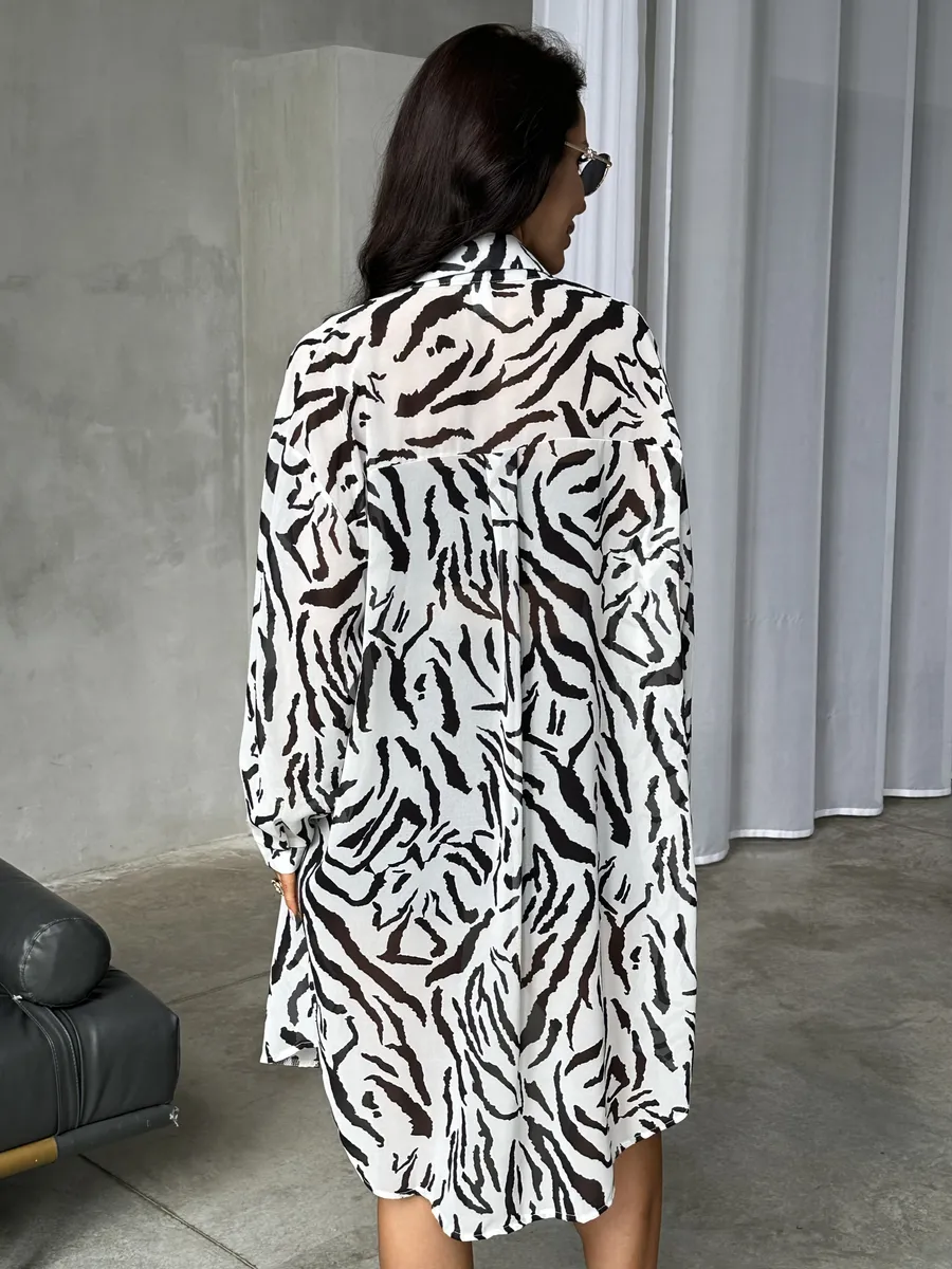 Белая рубашка оверсайз удлиненная