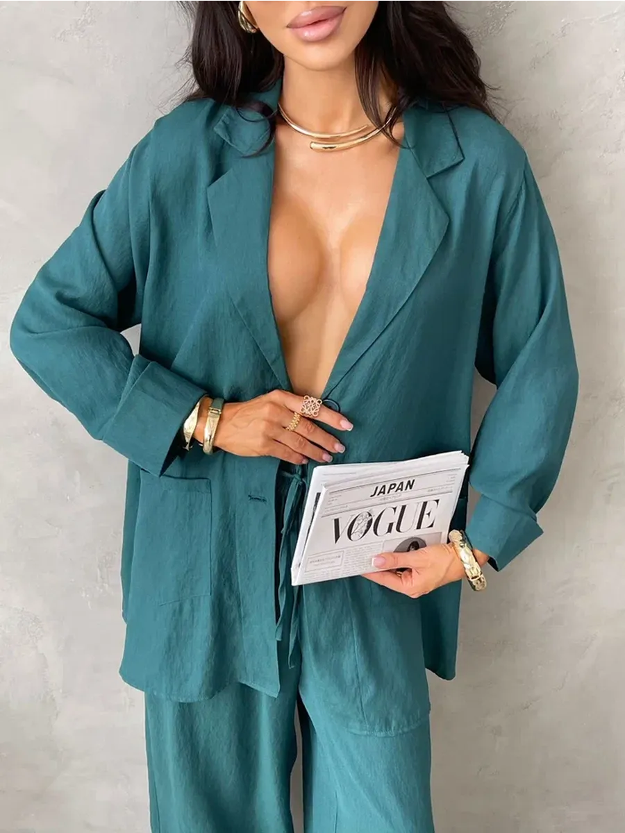 Зеленый костюм брючный летний двойка с пиджаком