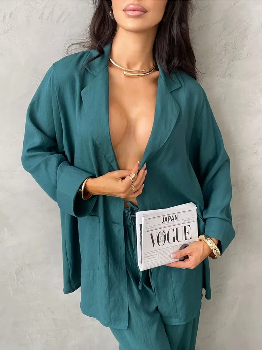 Зеленый костюм брючный летний двойка с пиджаком