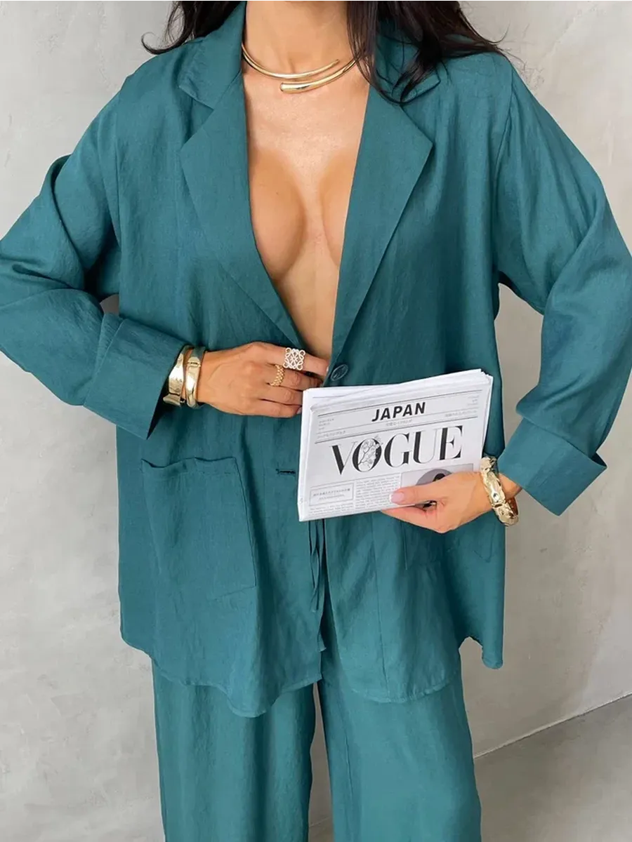 Зеленый костюм брючный летний двойка с пиджаком