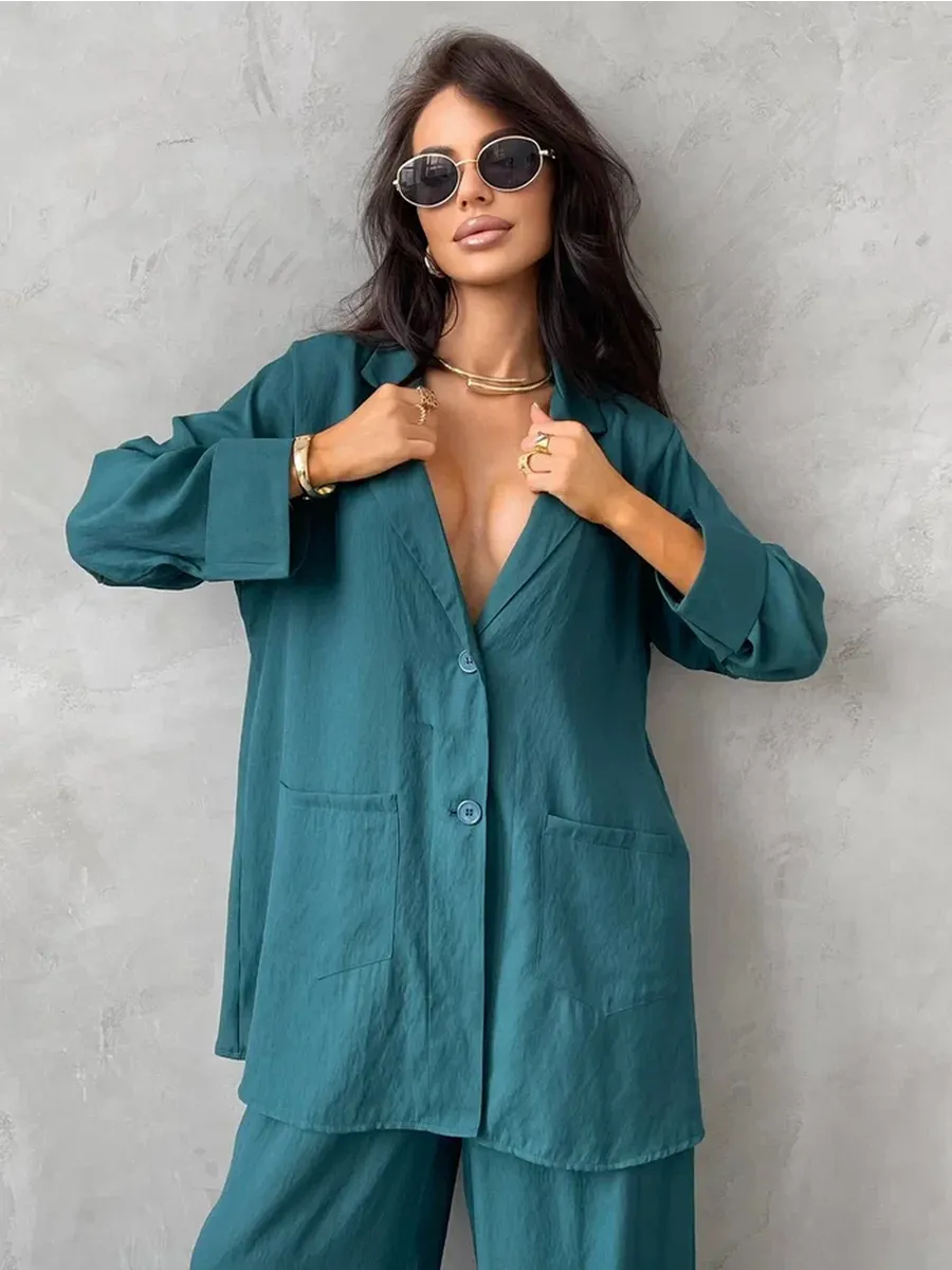 Зеленый костюм брючный летний двойка с пиджаком