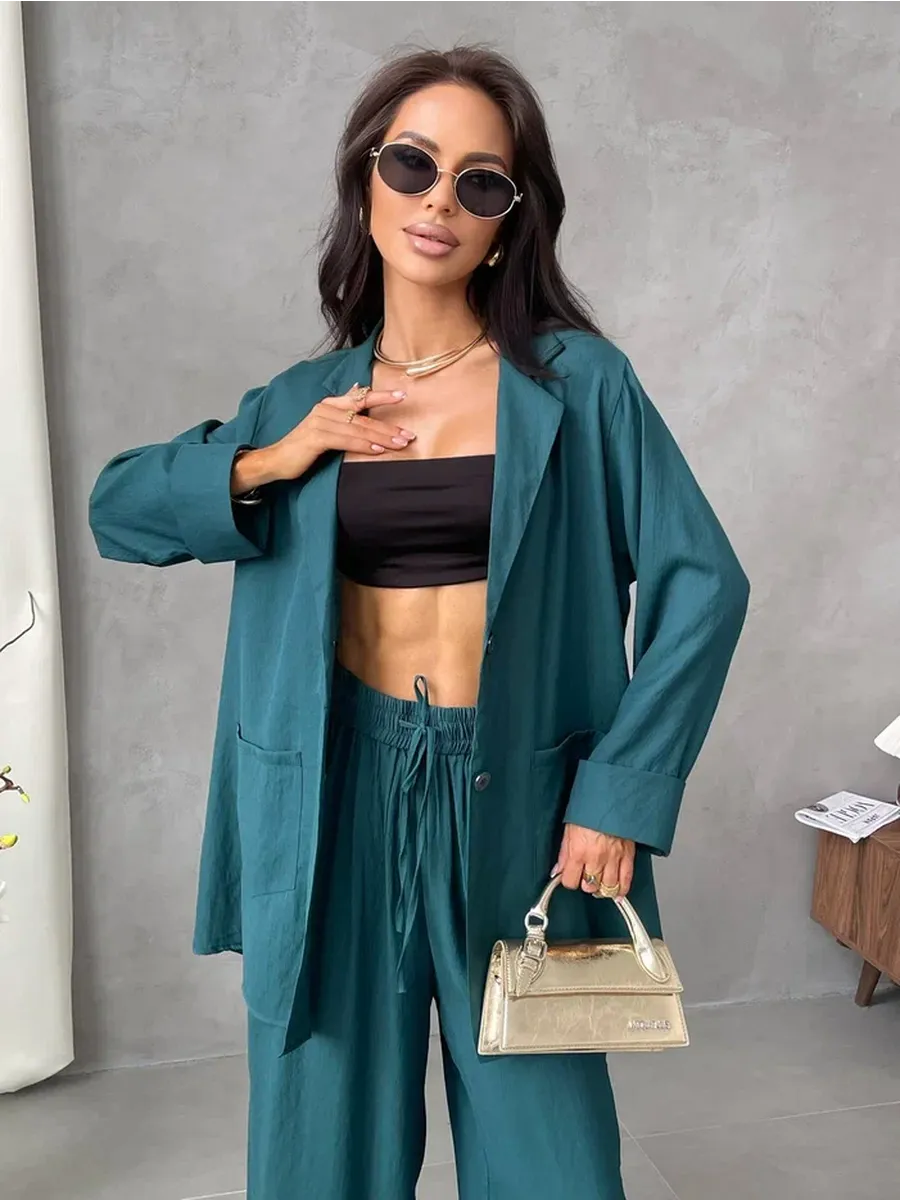 Зеленый костюм брючный летний двойка с пиджаком