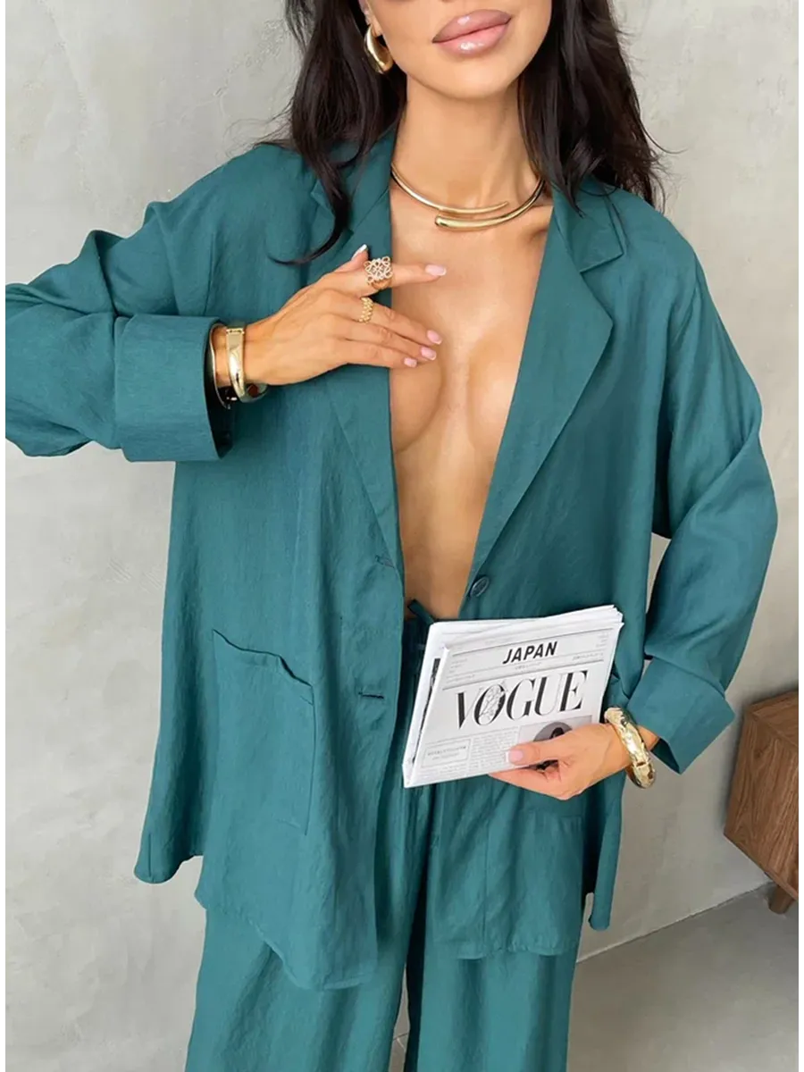 Зеленый костюм брючный летний двойка с пиджаком